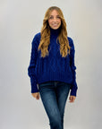 Maglione lupetto pesante con intrecci