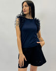 Maglia con maniche in tulle tinta unita