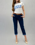 Pantaloni jeans con risvolti e cintura
