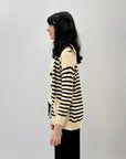 Cardigan over a righe