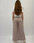 Pantaloni a righe con dettaglio elastico in vita
