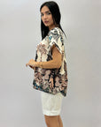 Maglia comoda con fantasia palma