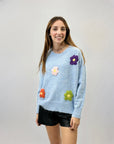 Maglione morbido con fiori ricamati
