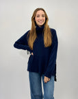 Maglione collo alto con frange