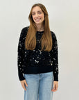 Maglione con paillettes – Eleganza luminosa