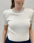 Maglia con decorazioni gioielli