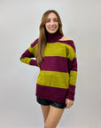 Maglione dolcevita a righe dettaglio cut-out