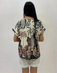 Maglia comoda con fantasia palma