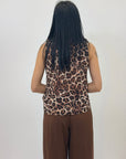 Blusa smanicata con rouches