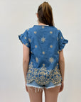 Maglia con ricami e volant