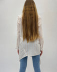 Camicia a righe con fondo asimmetrico