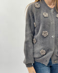 Cardigan morbido con ricami rose