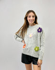 Maglione morbido con fiori ricamati
