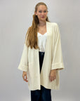 Cardigan lungo comodo con tasche