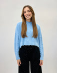 Pullover crop con rotture