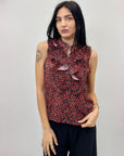 Blusa smanicata con rouches