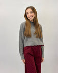 Pullover crop con rotture