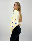 Maglione crop lupetto con ponpon