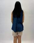Maglia in denim smanicata con collo rotondo