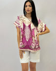 Maglia comoda con fantasia palma