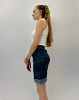 Pantaloncini con ricami margherita e risvolto