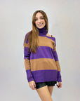 Maglione dolcevita a righe dettaglio cut-out