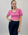 Maglia con decorazioni gioielli