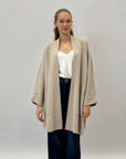 Cardigan lungo comodo con tasche