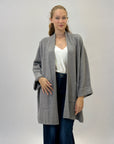 Cardigan lungo comodo con tasche