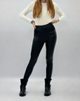 Leggings felpati in ecopelle con vita elasticizzata