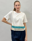 T-shirt con paillettes e frange