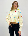 Maglione crop lupetto con ponpon