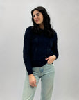 Maglione con intreccio e pelo