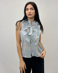 Blusa smanicata con rouches