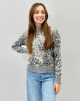 Maglione con paillettes – Eleganza luminosa