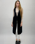 Gilet lungo con bottone