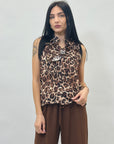 Blusa smanicata con rouches
