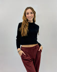 Pullover crop con intrecci