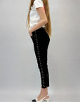 Jeans con borchie
