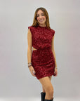 Abito corto con paillettes scollo schiena