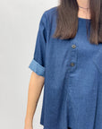 Camicia in jeans con bottoni laterali
