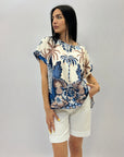 Maglia comoda con fantasia palma