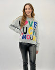 Maglione oversize con scritta love luck amor