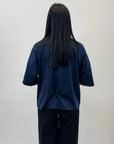 Maglia comoda con dettaglio bottoni