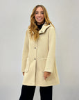 Cappotto in neoprene con cappuccio e bottoni