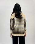 Cardigan over a righe
