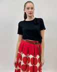 Maglia con nodo e fiore