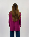 Maglione collo alto con frange