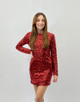 Abito petite con paillettes e scollo dietro