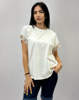 T-shirt con ricami maniche